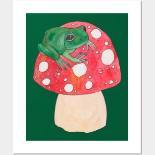 Green frog on red mushroom fly agaric Posters and Art